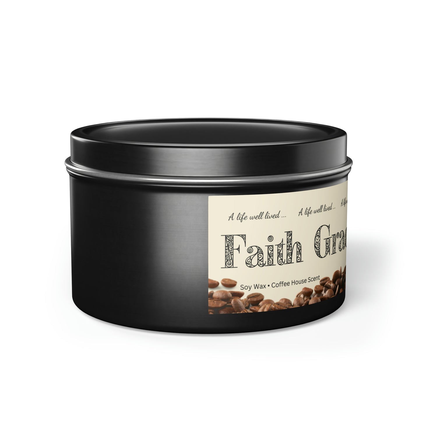 The side of a short black tin with a lid on it and a partial view of an ivory label with coffee beans along the bottom and the following words are visible: A life well lived ... Faith, Soy Wax, Coffee House Scent.