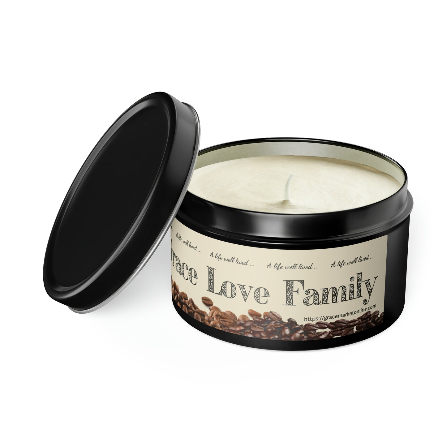 Black tin with an ivory candle inside, with the tin lid leaning against it, and the label on the side of the candle is ivory with repeating words of "A life well lived" and it has coffee beans on it and you can see some other words including Love and Family, sitting on a solid white background.