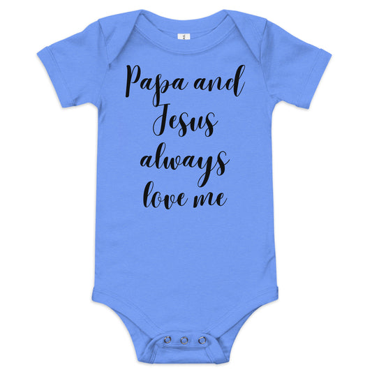 Blue short-sleeved onesie on white background with three snaps on bottom to close says Papa and Jesus always love me in black script lettering.