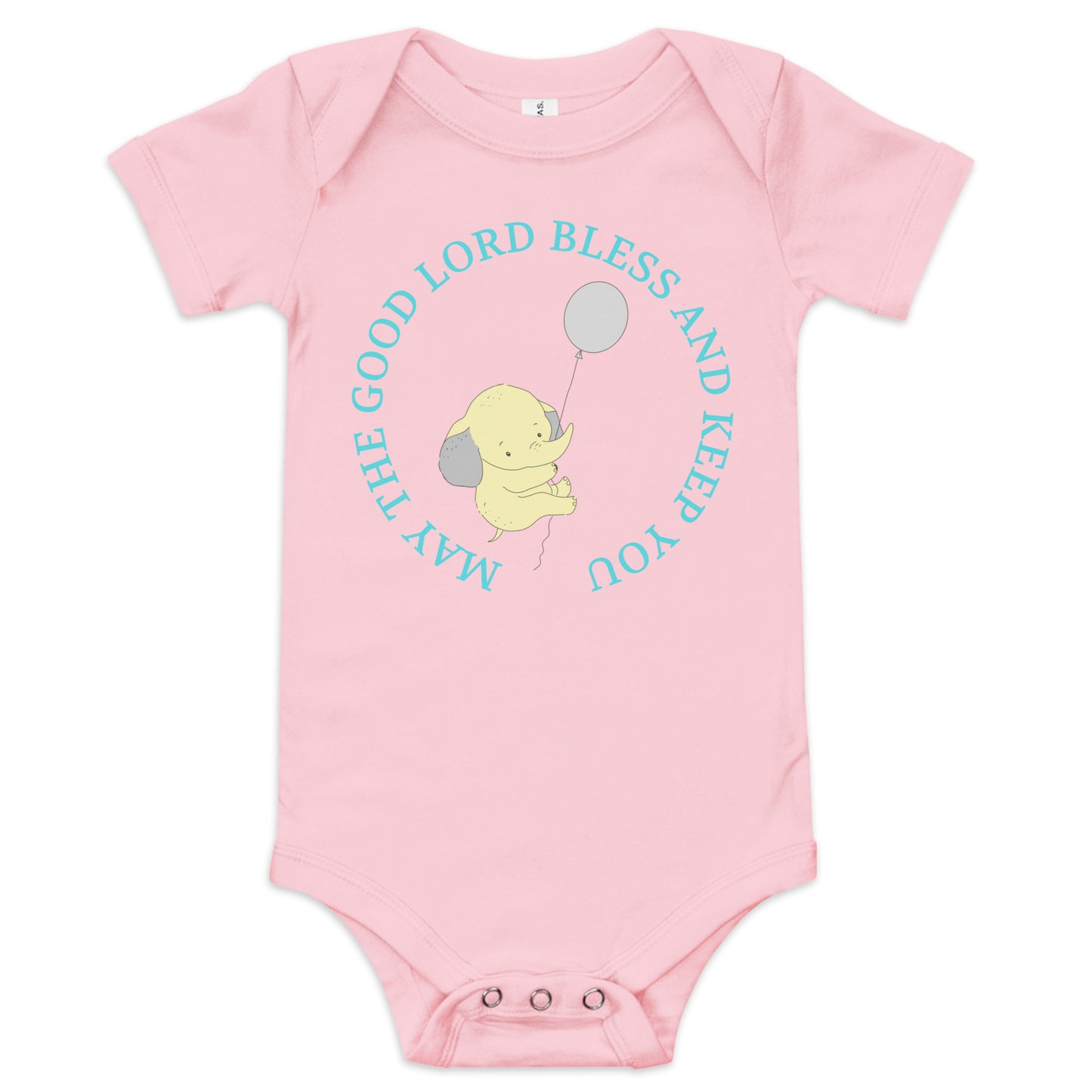 A pink short-sleeved onesie with snaps at the crotch is laying on a white background. In the center, in a circle, aqua letters say: May the Good Lord Bless and Keep You" and in the middle of that is a yellow elephant holding a balloon and they are floating up in the air.