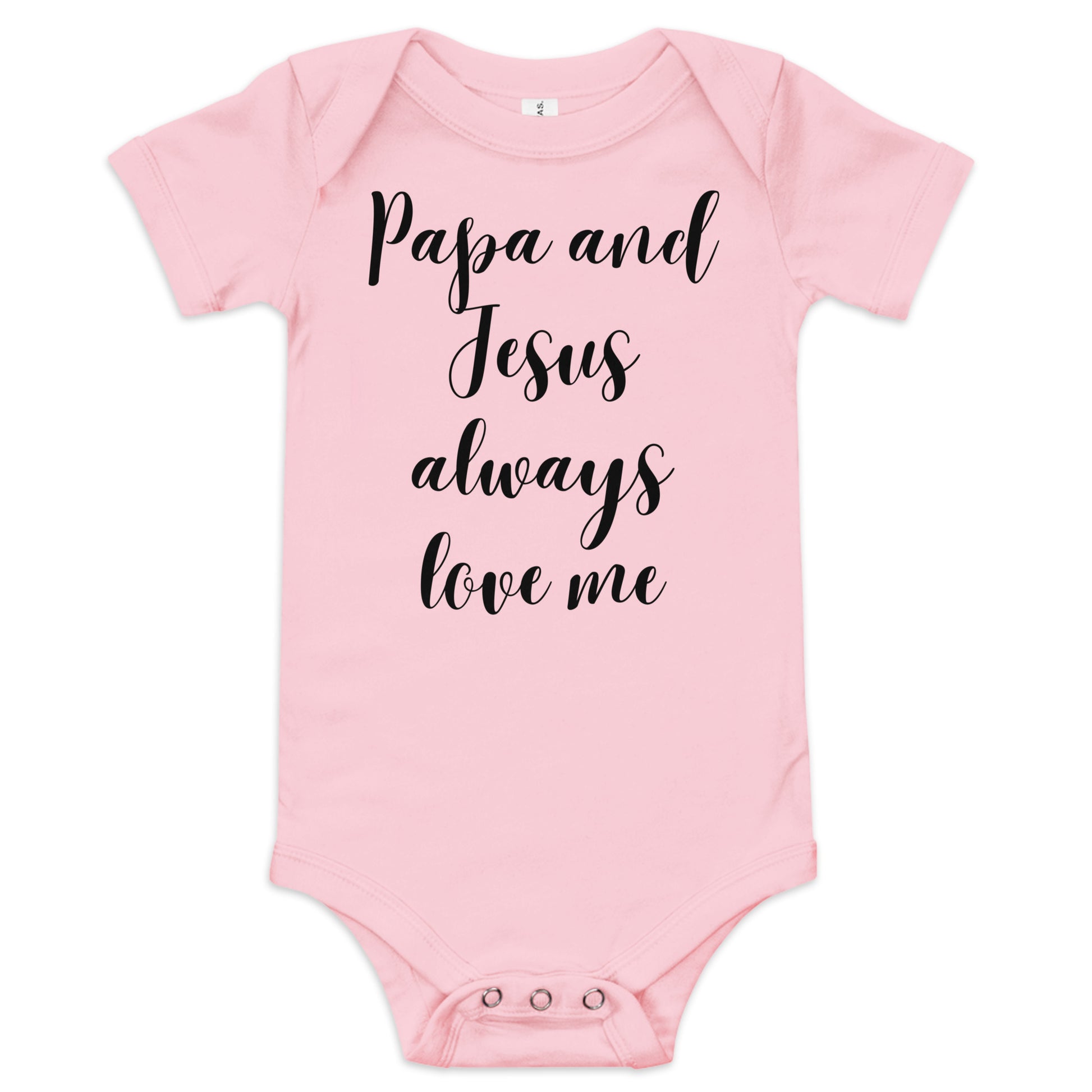 A white background showcases a light pink short-sleeved onesie with a three-snap closure at the bottom and black cursive words on the front that read:  Papa and Jesus always love me.