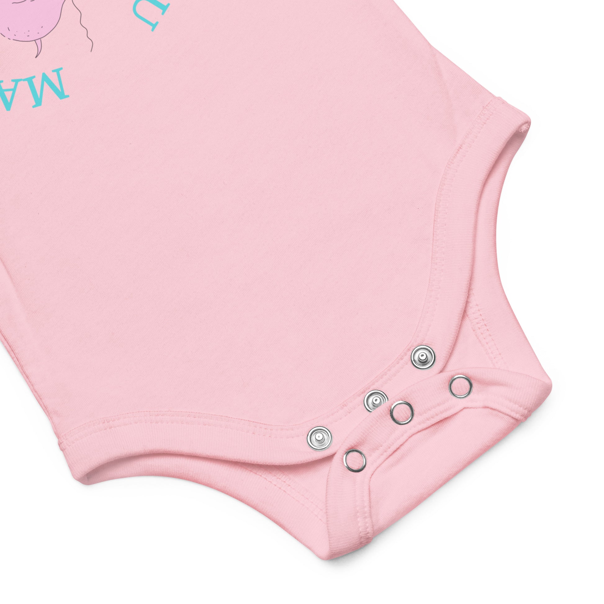 Close up of pink baby onesie showing the three metal snap closure in the diaper area.