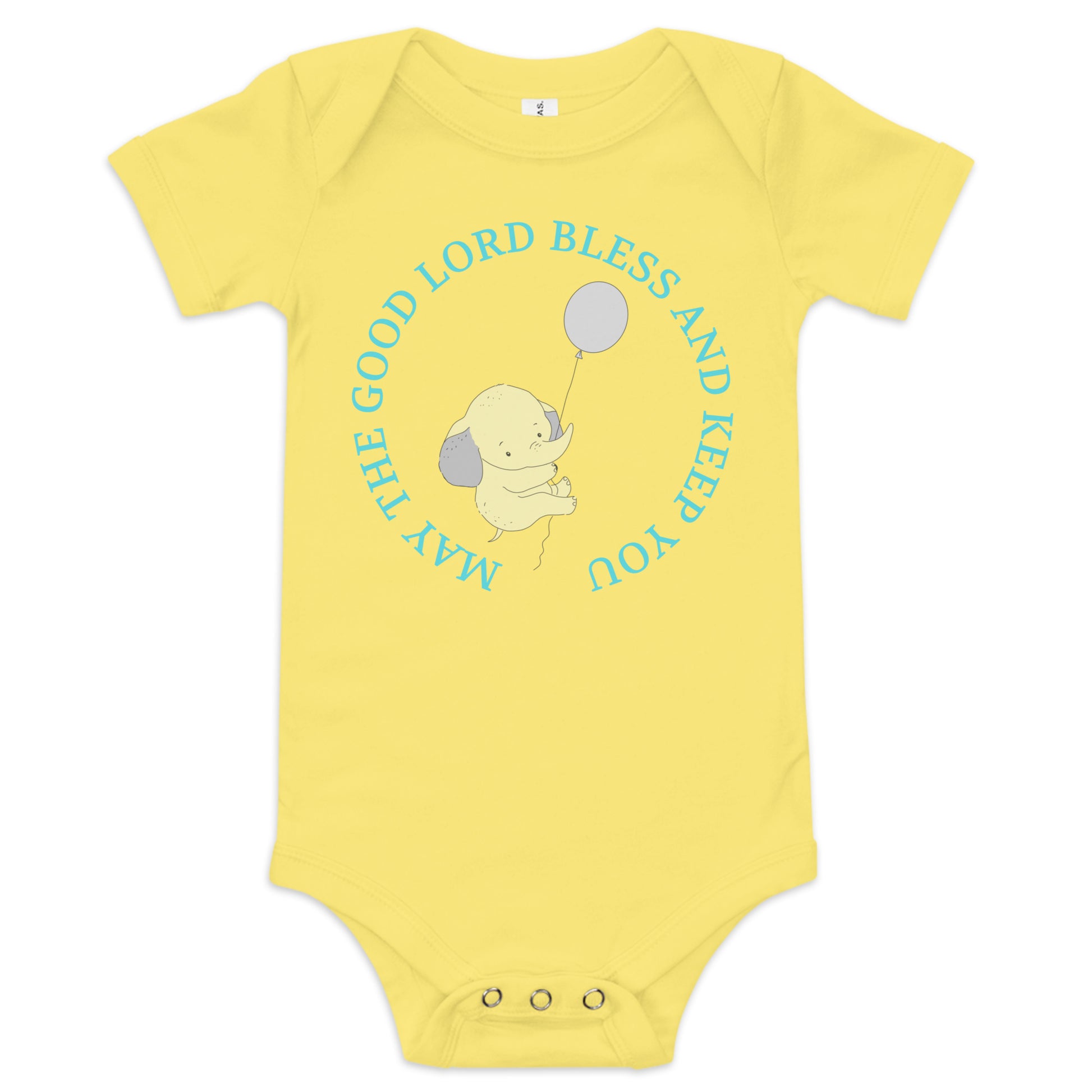 A yellow short-sleeved onesie with snap closures at the diaper area has a light yellow elephant holding a balloon and floating away in the center, surrounded by these words:  May the Good Lord Bless and Keep You.