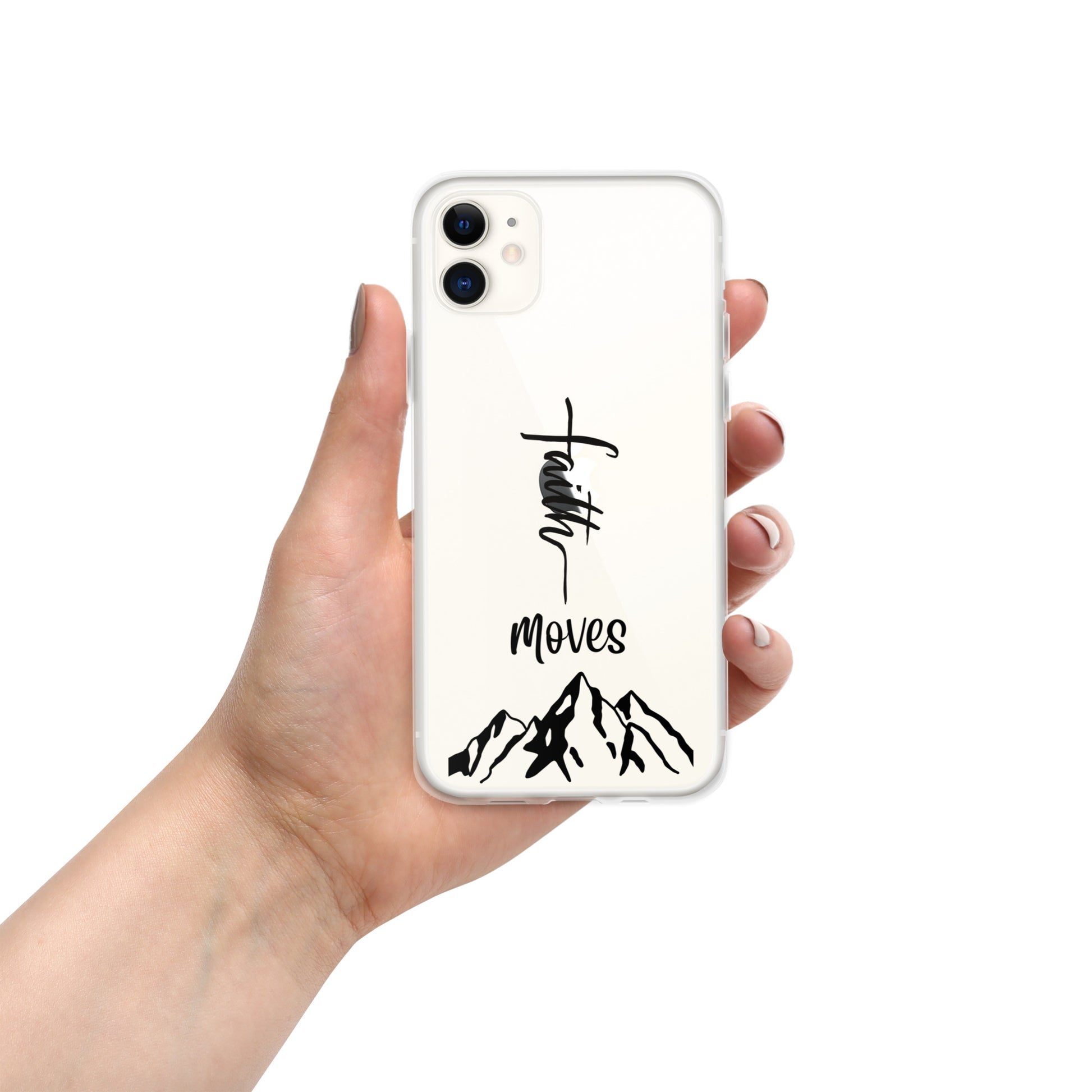 Clear iphone cover on white cell phone in woman's hand and case says faith moves and graphic of mountains.