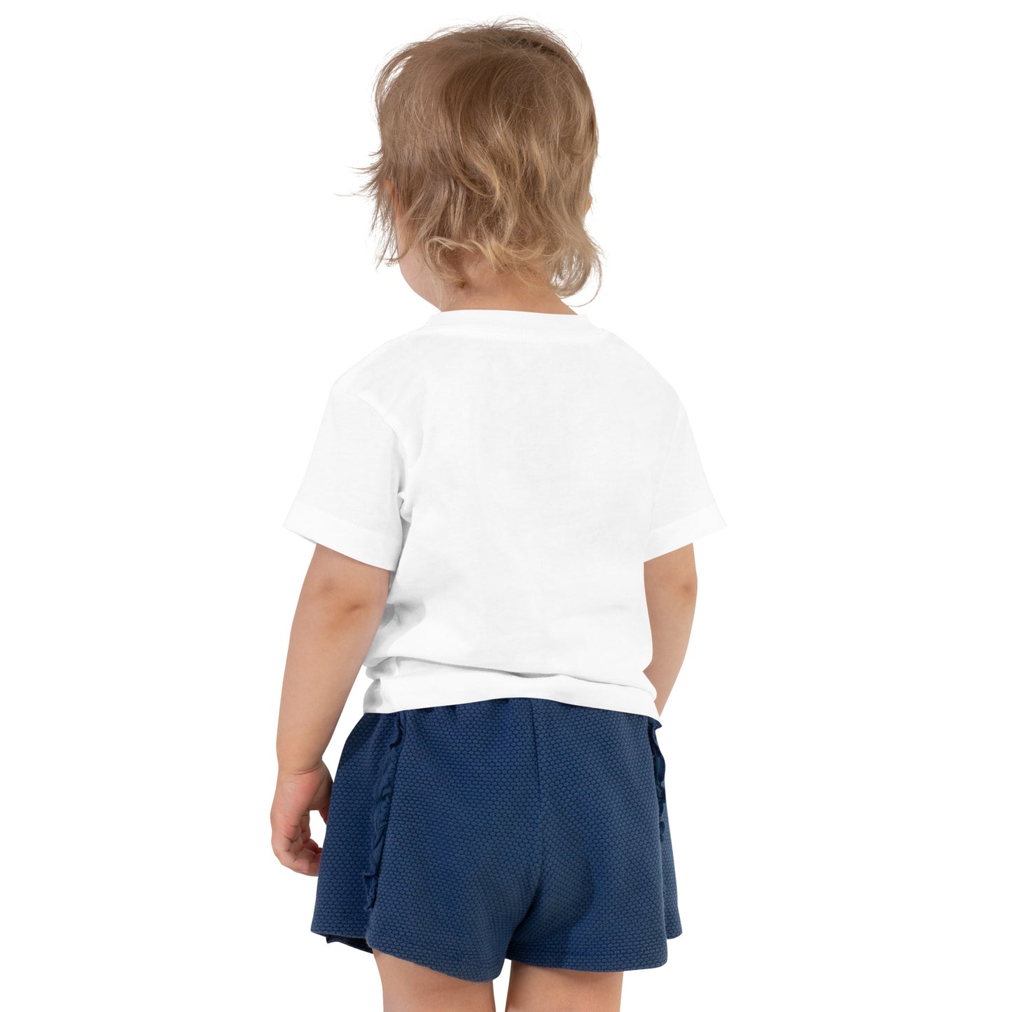 The back view of a little girl with short blonde wavy hair, navy shorts, and a white short-sleeved t-shirt.