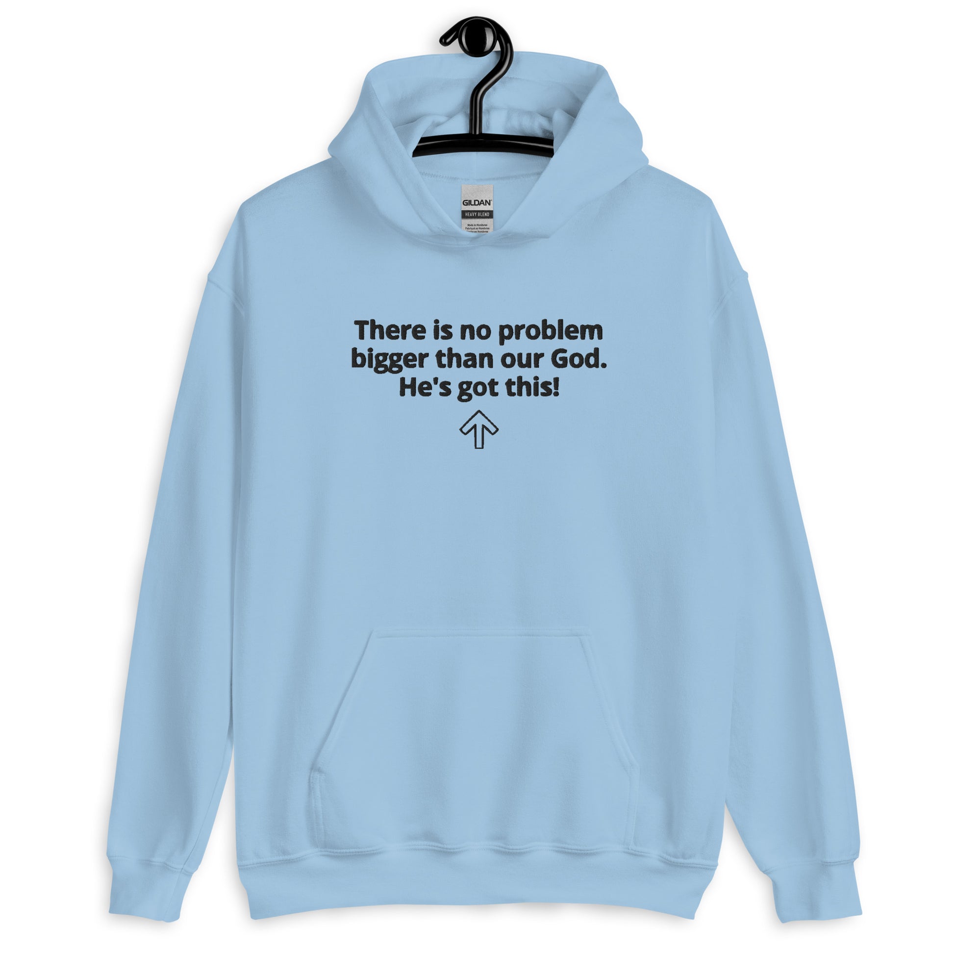 Light blue long-sleeved sweatshirt with a front pouch pocket hanging on a black hanger on a hook and the sweatshirt says "There is no problem bigger than our God. He's got this!" with an arrow pointing straight up.