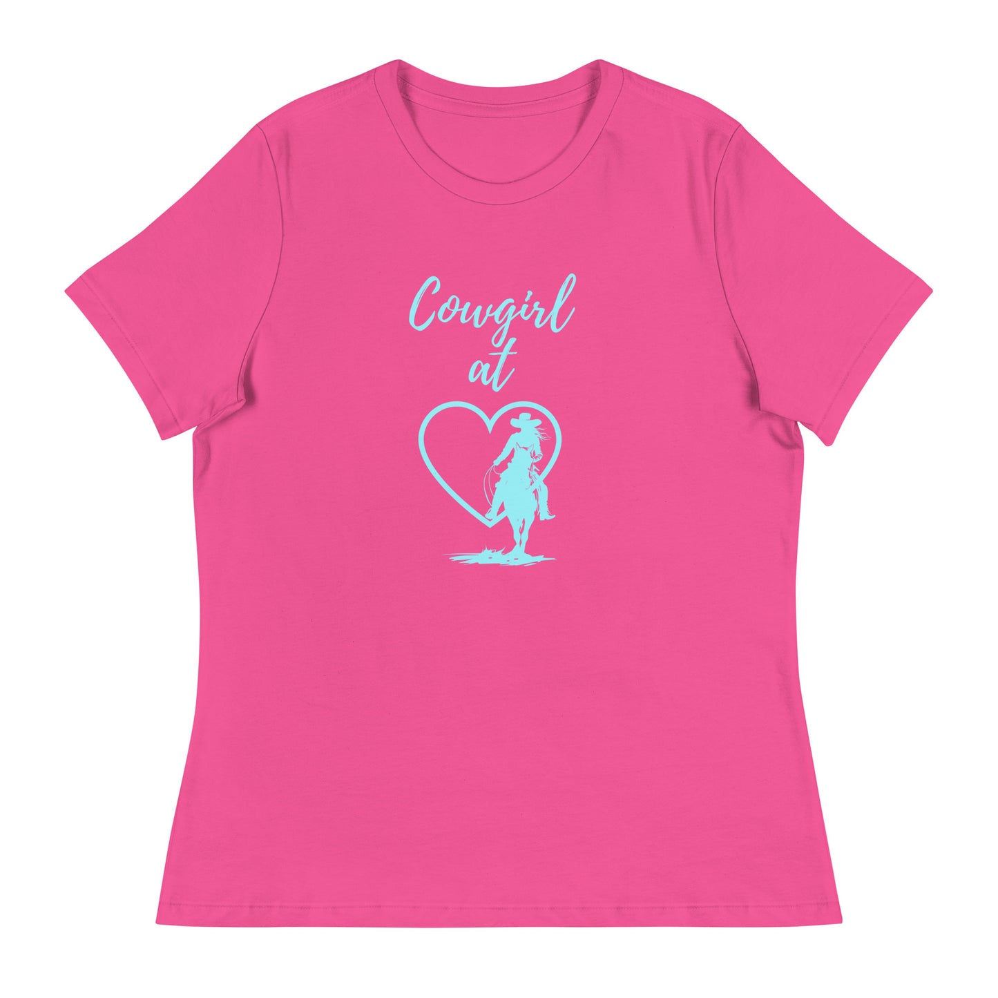 A bright pink short-sleeved t-shirt on a white background with an aqua design:  Cowgirl at and then a heart and a silhouette of a cowgirl riding a horse.