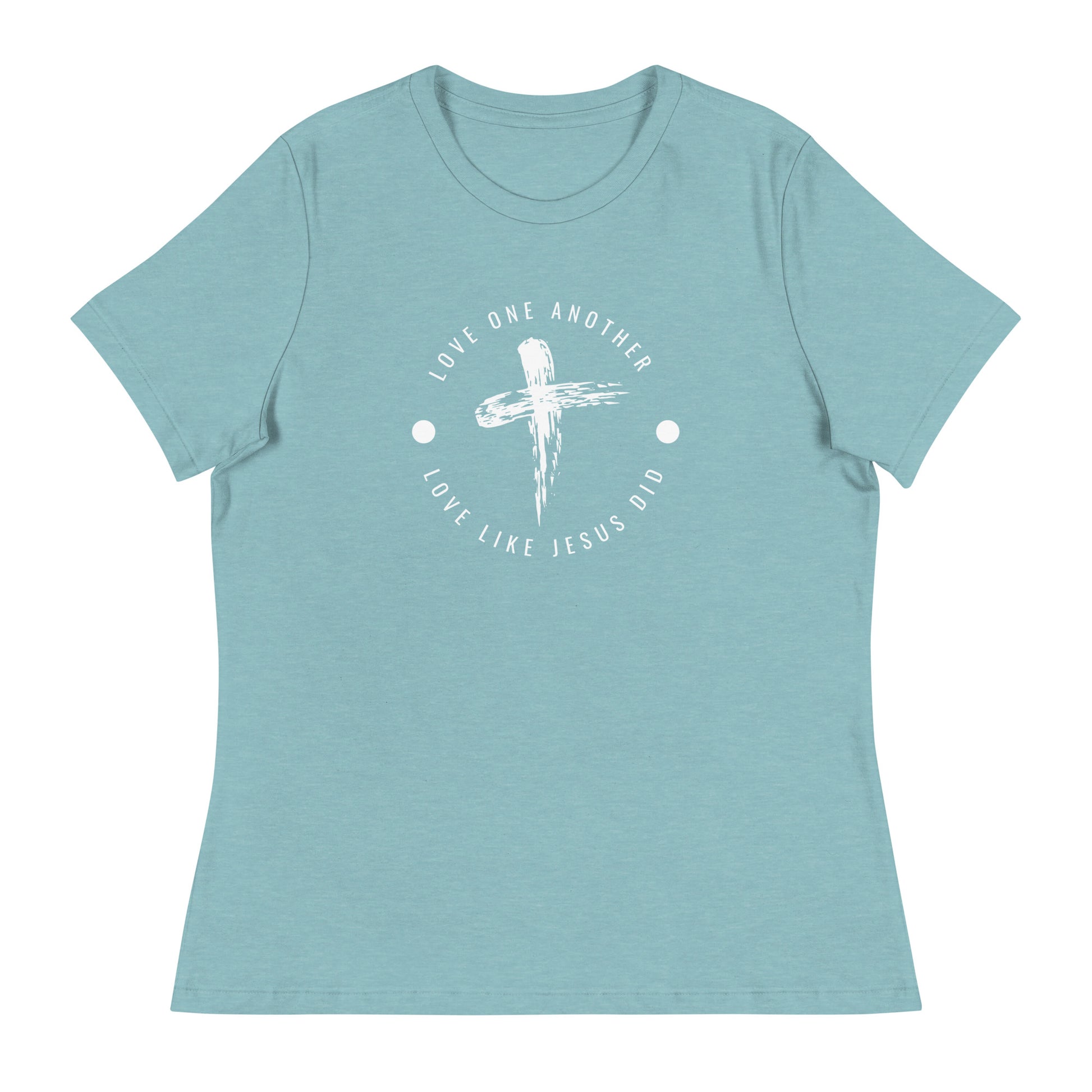 A short-sleeved scoop neck woman's t-shirt has the words Love one Another arched over a distressed cross graphic with the words Love Like Jesus Did in a reverse arch below it so that it looks like the words encircle the cross.