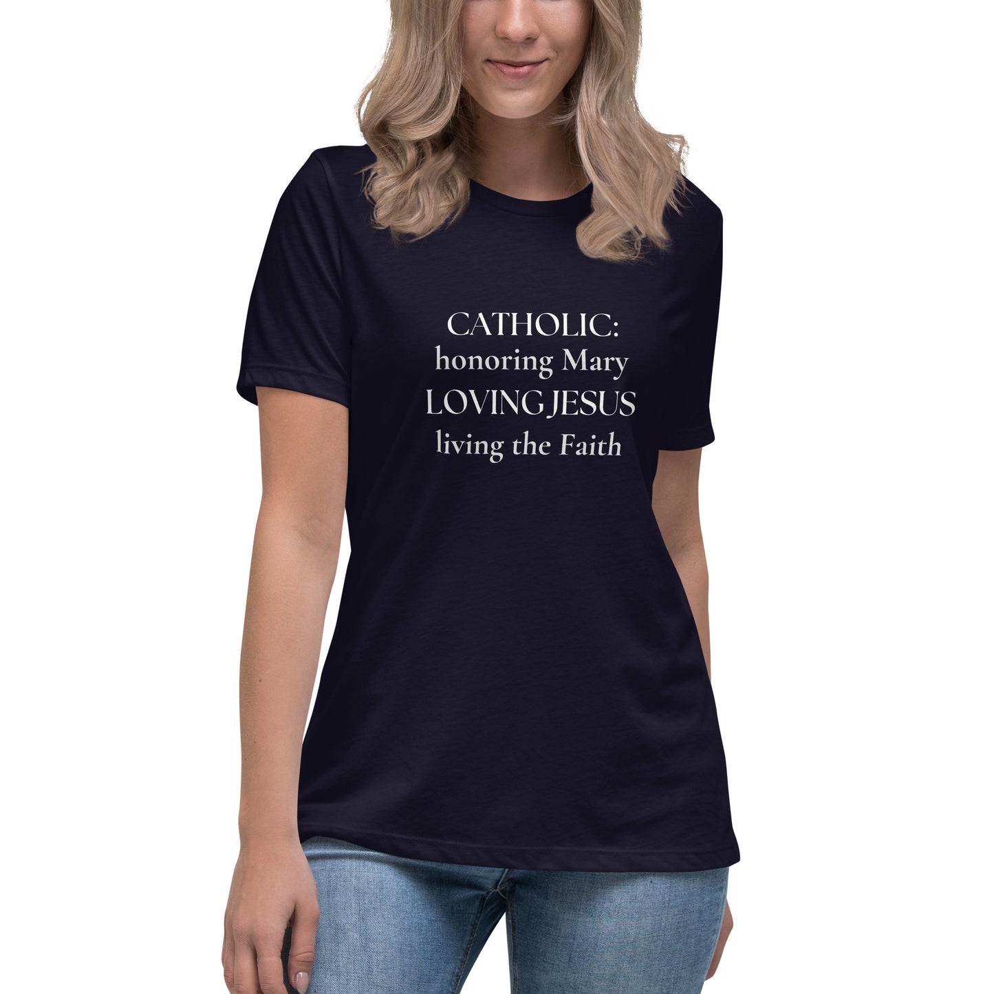 Blonde woman, partially visible, is wearing a navy t-shirt that says:  CATHOLIC:  honoring Mary LOVING JESUS living the Faith