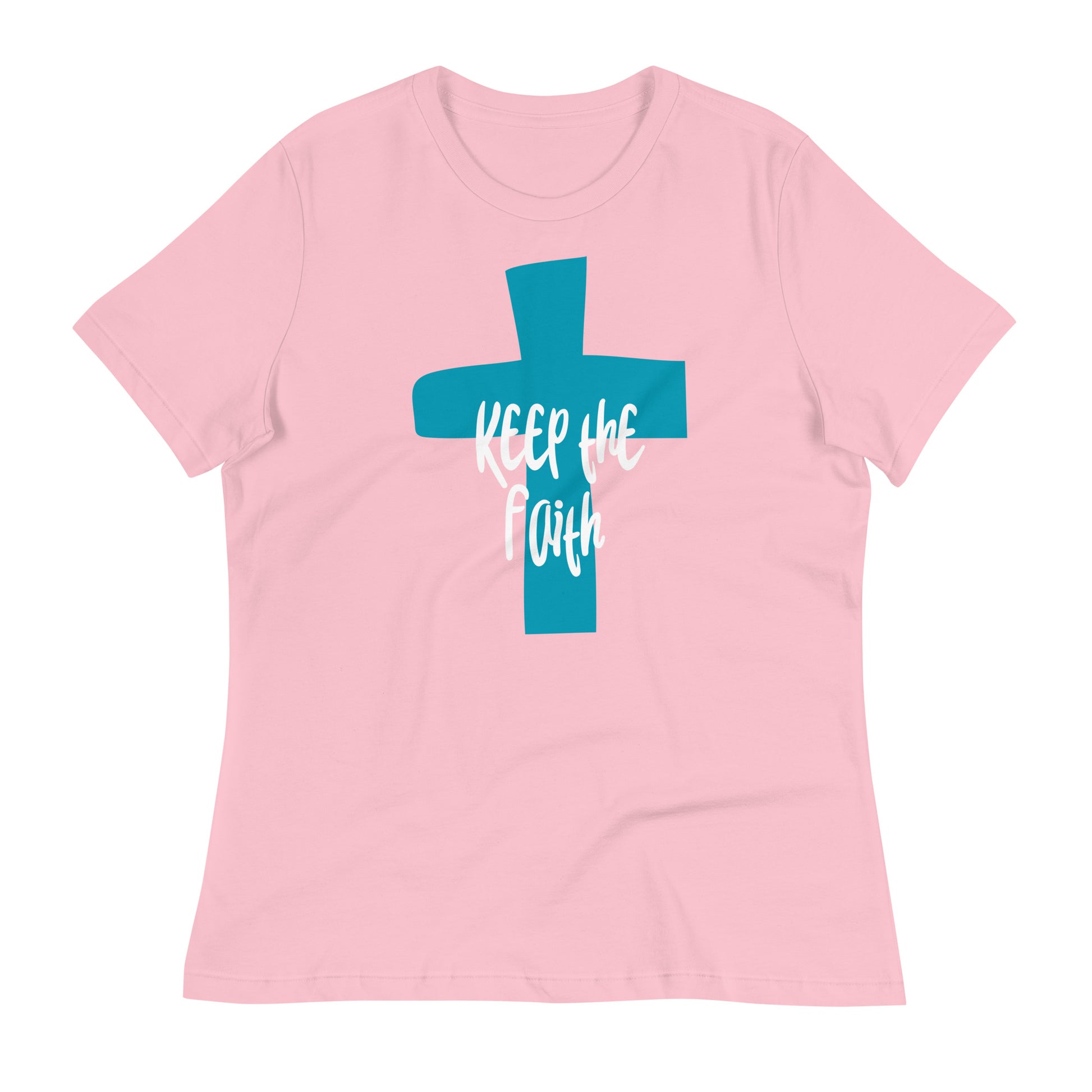 Light pink woman's t-shirt with short sleeves featuring a large dark aqua cross on the center chest area and the words "Keep the Faith" in white letters over top in a fun font.